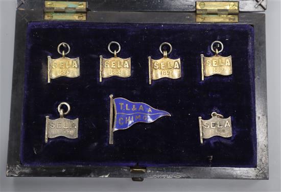 A quantity of S.E.L.A. 1890s badges